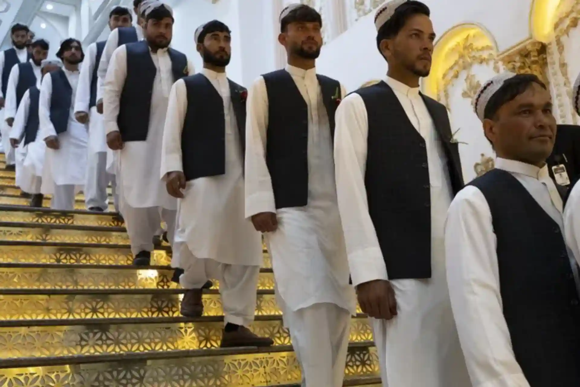 Afghan youths are getting married in mass weddings to save money