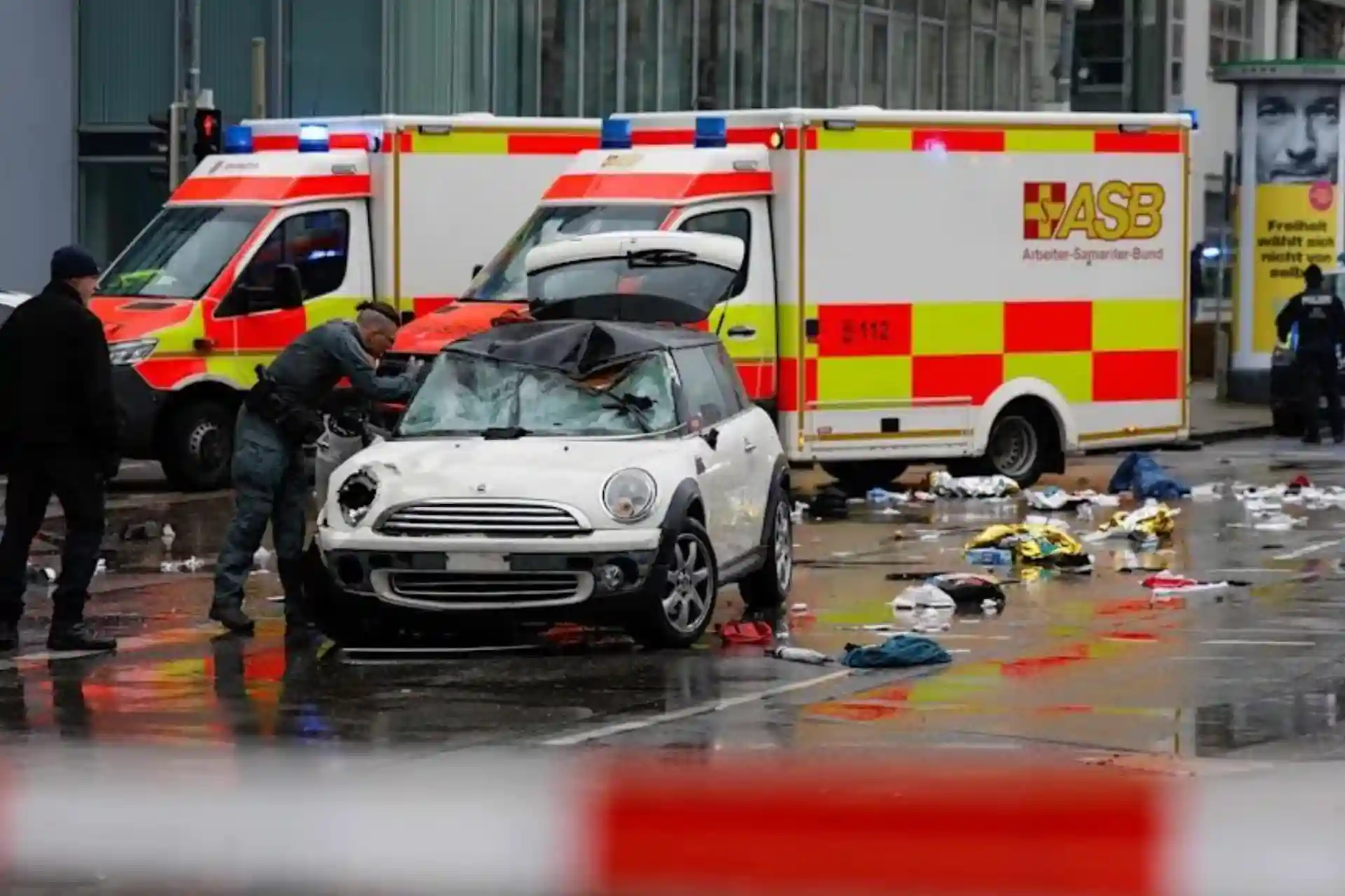 Car drives into crowd at Munich protest, at least 15 injured