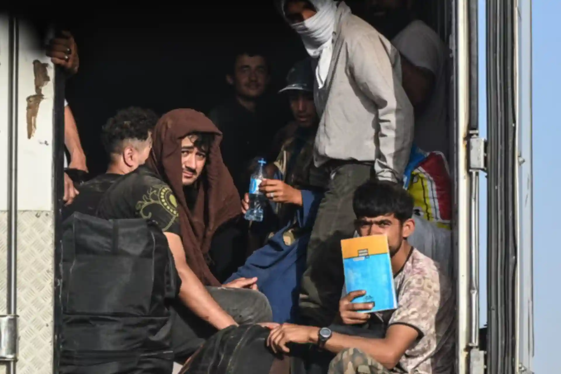 Iran expels Afghan immigrants, accusing them of espionage